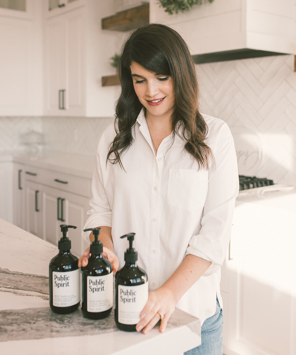 The brand founder with the products